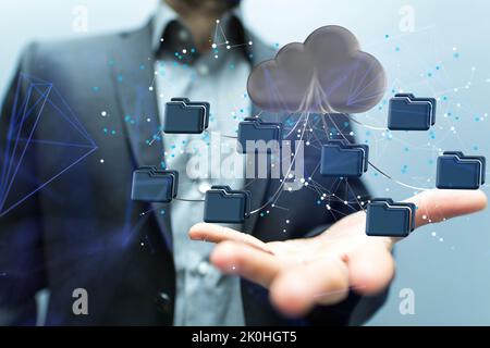 A businessman showing a 2D rendered big data cloud floating on the palm of his hand Stock Photo