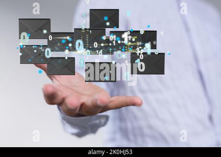 3d floating massage envelop icons  and binary code over a hand- a concept of connection, networking Stock Photo