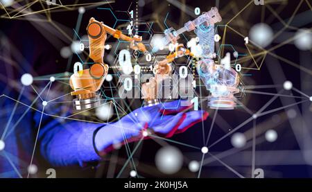 A man demonstrating models of robotic arms in a digital network of connected cells Stock Photo