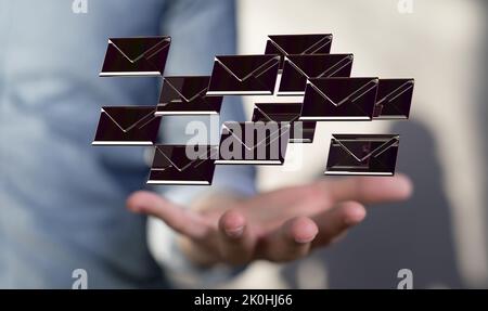 3d floating massage envelop icons over a hand- a concept of connection, networking Stock Photo