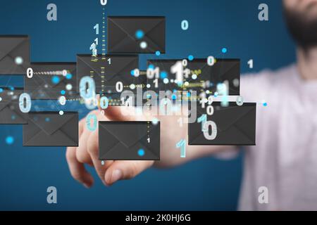 A finger pointing to 3d floating massage envelop icons - a concept of connection, networking Stock Photo