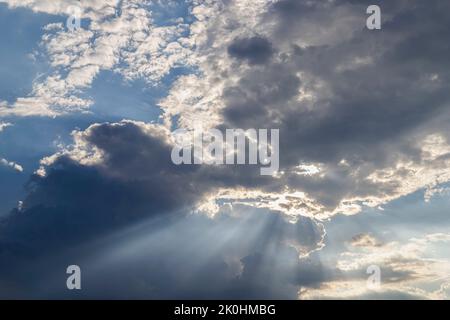 A light coming out of a spectacular blue sky Stock Photo