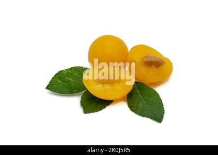 Spilling plum isolated on white background Stock Photo