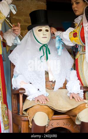 Ritual dressing of Su Composidori, Sartiglia feast, Oristano, Sardinia, Italy, Europe Stock Photo