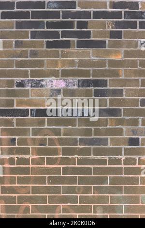 Typical common weathered brick wall. Stock Photo