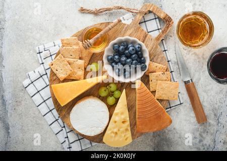 Wine glasses on grey background. Direct sunlight, aesthetic still life  Stock Photo - Alamy