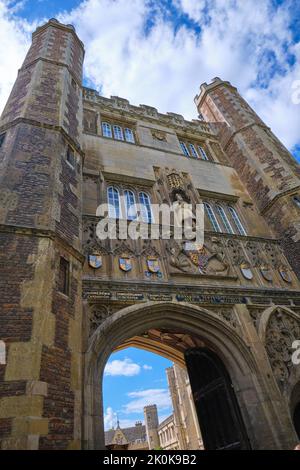 The impressive stone, Gothic entrance gate with sculpture at Trinity college. In Cambridge, England, United Kingdom. Stock Photo