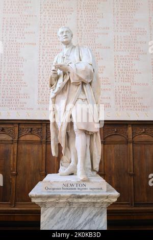 A white marble statue of Sir Isaac Newton, in the Trinity college chapel. In Cambridge, England, United Kingdom. Stock Photo