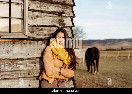 Woman In Ranch Style House Climbing Ladder To Bunk Bed Canvas