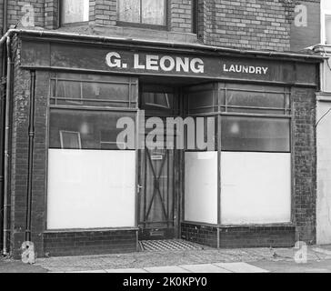 Haunting historic Chinese laundry shop, G.Leong, 117 penny Lane, Liverpool, Merseyside, England, UK, L18 - apparently haunted BW Stock Photo