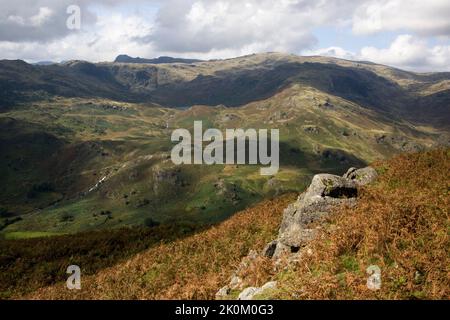 View over Easedale showing Easedale Tarn and Sourmilk Gill, taken from the top of Helm Crag, known locally as 'The Lion and the Lamb'. Grasmere, lake Stock Photo