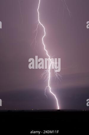 Lightning strikes the earth near Russell, Kansas, USA Stock Photo