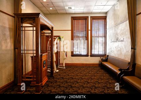 SANTA ANA, CALIFORNIA - 22 AUG 2022: One of the rooms where weddings are performed at the Old Orange County Courthouse, with Love is Patient written o Stock Photo