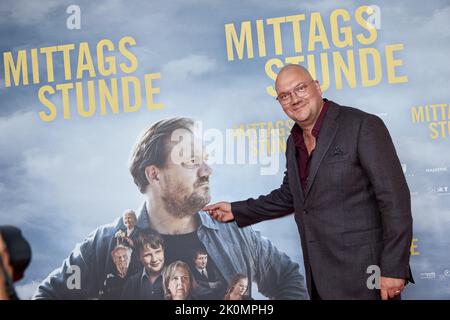 Husum, Germany. 12th Sep, 2022. Charly Hübner, actor, comes to the premiere of the film 'Noon hour' in the cinema center Husum. Credit: Georg Wendt/dpa/Alamy Live News Stock Photo
