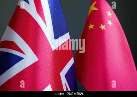 Next to the flags of Great Britain and China. Stock Photo