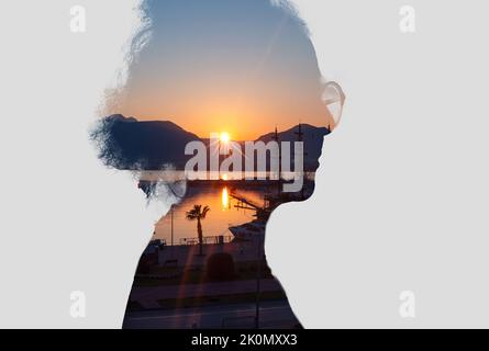 Woman head silhouette and sunrise landscape photo with double exposure effect. Concept of inner peace and mental health, power and wellness Stock Photo