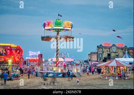 Fun fair on St Annes beach during the international kite festival Stock Photo