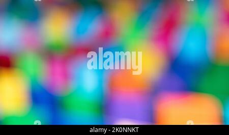 A close-up of an out-of-focus abstract background with bright mixed colors. Abstract graphics source Stock Photo