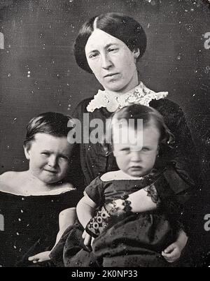 Portrait of Julia Dent Grant (the wife and First Lady of president Ulysses Grant) with her eldest children, Frederic Dent Grant and Ulysses S. Grant, Jr. The photo is from 1854 when Julia was 28 yrs old.This portrait is unusual in that she is seen looking at the camera. She suffered from strabismus (crossed eyes) and consequently most of her portraits are in profile. Stock Photo
