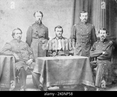 General Ulysses S. Grant and members of his staff during the American Civil War. From left to right are:  Ely Samuel Parker,     Adam Badeau, Lieutenant-General Ulysses Grant, Orville Elias Babcock and  Horace Porter. Stock Photo