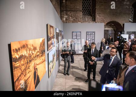 Istanbul, Turkey, 12/09/2022, Anadolu Agency General Manager Serdar Karagoz (right 2) seen giving information about the work named ''Evia'' which was chosen ''Photo of the Year''. Istanbul Photo Awards 2022 Exhibition At Mimar Sinan Fine Arts University Tophane-i Amire Culture and Art Center, at the Single Dome building, with the participation of Anadolu Agency General Manager Serdar Karagoz, after the opening speech, Mimar Sinan Fine Arts University Rector Prof. Dr. Handan ?nci Elci opened with the presence of Beyoglu Mayor Haydar Ali Yildiz and guests. Award-winning photographs will be open  Stock Photo