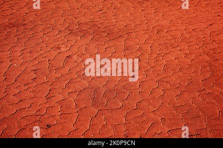 cracked and dry red ground, global warming concept Stock Photo
