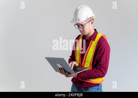 Architects, civil engineers, engineers working on laptops in a studio.  Architect, Engineer, Civil Concept of Construction. Stock Photo