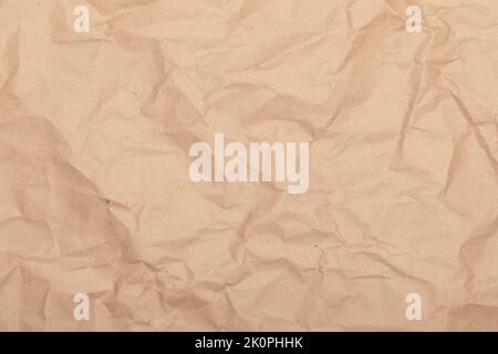 Sheet of brown wrinkled kraft made from recycled paper with texture and details Stock Photo