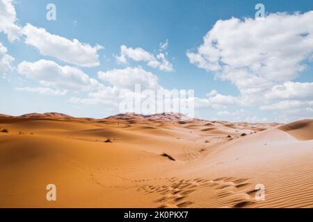 Majestic beautiful scene of Merzouga dunes of Sahara desert Morocco. Stock Photo