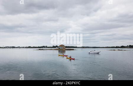 Couple canoeing on the lake Stock Photo