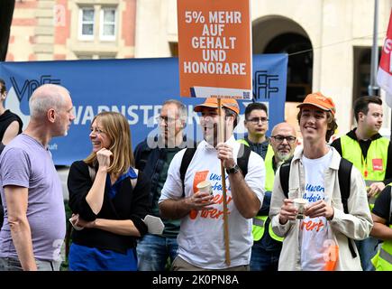 Cologne, Germany. 13th Sep, 2022. Employees of Westdeutscher Rundfunk (WDR) demonstrate in front of the broadcasting company for higher wages. Credit: Roberto Pfeil/dpa/Alamy Live News Stock Photo