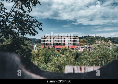 Old eastern european building located in the mountains valey .Carpathian   mountains , Europe Romania. Abandoned building, from the  mines business. Stock Photo