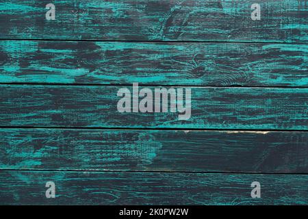 Natural scuffed patterns on the wall. Old Grand wooden textured background. Blue boards old design. Turquoise color. Painted timber. Horizontal board. Vintage wood texture blue panel. Stock Photo