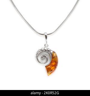 Amber jewellery set in a variety of different fittings from Octopus to bees. 925 silver.  Shot on white backgrounds. Stock Photo