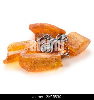 Amber jewellery set in a variety of different fittings from Octopus to bees. 925 silver.  Shot on white backgrounds. Stock Photo