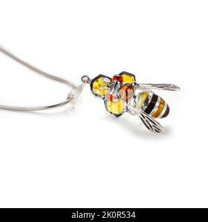 Amber jewellery set in a variety of different fittings from Octopus to bees. 925 silver.  Shot on white backgrounds. Stock Photo