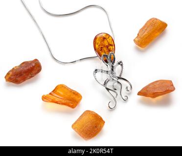 Amber jewellery set in a variety of different fittings from Octopus to bees. 925 silver.  Shot on white backgrounds. Stock Photo