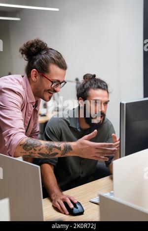 Software engineers working on project and programming in company Stock Photo