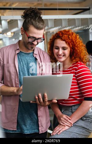 Programmers cooperating at IT company developing apps. People business work office concept Stock Photo
