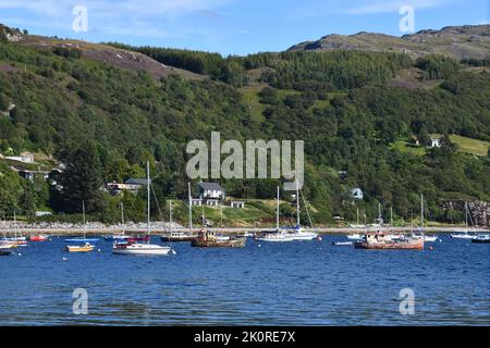 Yachts moored in the bay off Ullapool on Loch Broom, Scotland, UK Stock Photo