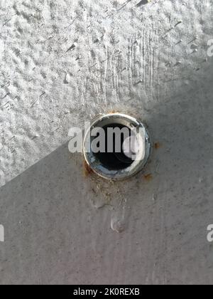 peephole of an old door Stock Photo