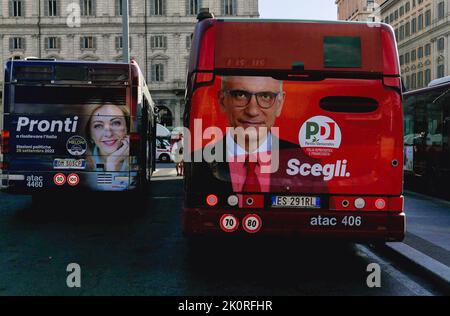 Italy. 12th Sep, 2022. Posters of Enrico Letta and Giorgia Meloni seen on a buses as Electoral posters are displayed in Rome, Italy, on September 12 2022. Italy will hold early parliamentary elections on September 25, as Italian Premier Mario Draghi resigned last July. (Photo by Elisa Gestri/SIPA USA) Credit: Sipa USA/Alamy Live News Stock Photo