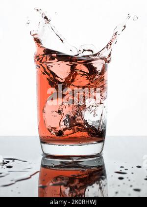 High speed captures of ice cubes dropping into glasses of drinks. Check out my full range. Stock Photo