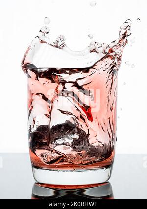 High speed captures of ice cubes dropping into glasses of drinks. Check out my full range. Stock Photo