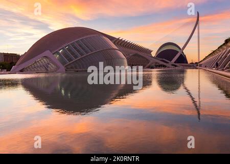 Hemisfèric, a digital 3D cinema & planetarium, with Museu De Les Ciencies behind at City of Arts and Sciences in Valencia, Spain at sunrise in Sept Stock Photo
