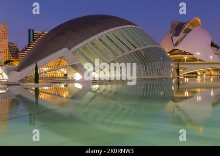 Hemisfèric,a digital 3D cinema & planetarium with Palau de les Arts Reina Sofía behind at City of Arts and Sciences in Valencia Spain at dawn in Sept Stock Photo