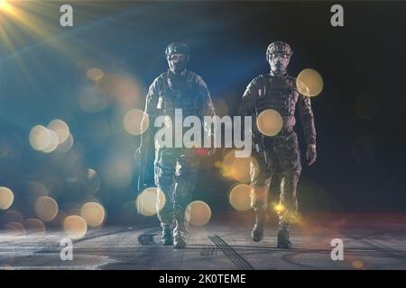 soldiers squad in night mission Stock Photo