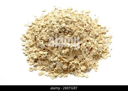 A pile of porridge oats on white background Stock Photo