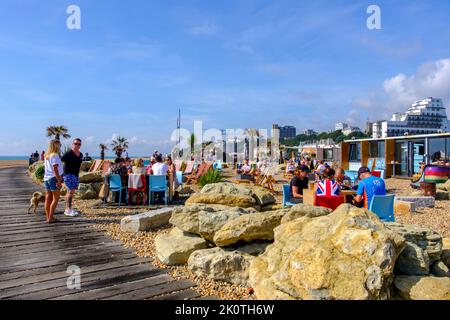 Folkestone, seaside cafes on the beach, by the boardwalk, Kent, UK Stock Photo