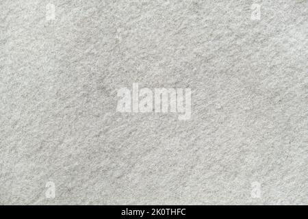 The texture of white felt. Silver felt background. Felt like snow. Stock Photo
